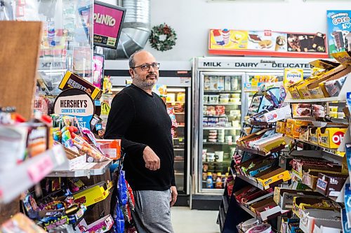 MIKAELA MACKENZIE / WINNIPEG FREE PRESS
 
Monissh Kapoor, owner of Barchet's Grocery, poses for a photo in his shop in Winnipeg on Thursday, May 11, 2023. Monissh is selling the corner store because of health issues. For Gabby story.

Winnipeg Free Press 2023.