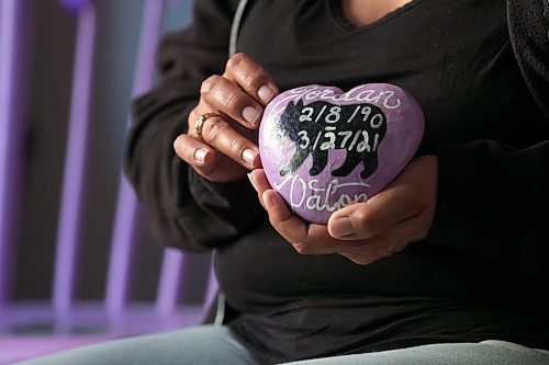 RUTH BONNEVILLE / WINNIPEG FREE PRESS 

Local - Mom's day feature

Barbara Mercredi tries to hold back her tears as she talks about losing her son, Jordan, to drug use.  

She holds a rock shaped in a heart that her family painted to create a memorial stone for her.  There is a special purple chair sits in her living room with his photo and inscription.on it that is part of her memorabilia to honour and remember him in her home.  Also, she hangs purple lights which is the colour for drug overdose awareness.  

See Katrina's story 

May 10th,, 2023