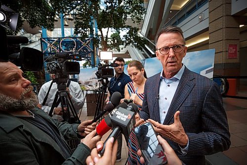 Mike Deal / Winnipeg Free Press
Mark Chipman, executive chairman, True North Sports and Entertainment, during a scrum with media after the event.
True North Real Estate Development announces its plan to re-develop Portage Place into a &#x201c;campus for health, wellness and neighbourhood services&#x201d; during an event attended by Premier Stefanson, Mark Chipman, executive chairman, True North Sports and Entertainment, Jim Ludlow, president, True North Real Estate Development, and Lanette Siragusa, CEO, Shared Health Friday morning in the mall&#x2019;s atrium.
230512 - Friday, May 12, 2023.