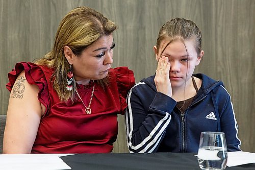 Mike Deal / Winnipeg Free Press
Elle Harris (right), daughter of Morgan Harris, wipes away tears, while sitting with Melissa Normand (left), a cousin of Morgan Harris, during a discussion about the feasibility study regarding Prairie Green and the next steps in the search for her mother&#x2019;s body.
The Assembly of Manitoba Chiefs hold a press conference &quot;in partnership&quot; with Long Plain First Nation and the families of Rebecca Contois, Morgan Harris and Marcedes Myran to announce the completion of the landfill search feasibility study regarding Prairie Green and discuss the next steps at the Wyndham Garden Hotel, Long Plain First Nation, 460 Madison Street, Friday afternoon.
230512 - Friday, May 12, 2023.