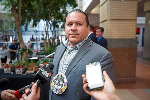 Mike Deal / Winnipeg Free Press
Jerry Daniels, Grand Chief of the Southern Chiefs' Organization (SCO), during a scrum with media after the event.
True North Real Estate Development announces its plan to re-develop Portage Place into a &#x201c;campus for health, wellness and neighbourhood services&#x201d; during an event attended by Premier Stefanson, Mark Chipman, executive chairman, True North Sports and Entertainment, Jim Ludlow, president, True North Real Estate Development, and Lanette Siragusa, CEO, Shared Health Friday morning in the mall&#x2019;s atrium.
230512 - Friday, May 12, 2023.