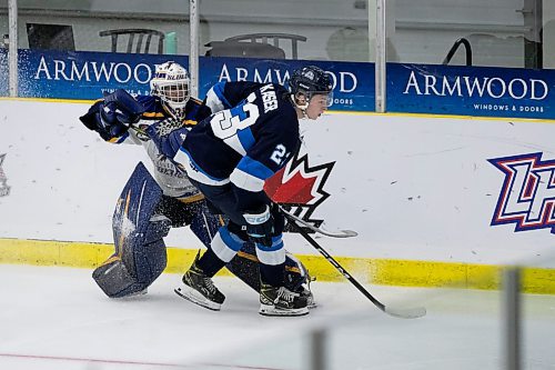 BROOK JONES / WINNIPEG FREE PRESS
The Steinbach Pistons face the Collingwood Blues in Centennial Cup action at Stride Place in Portage la Prairie, Man., Thursday, May 11, 2023.. The 51st edition of Canada's National Junior A Championship runs May 11 to 21. Pictured: Pistons forward Brett Kaiser gets tangled with Blues goalie Noah Pak during second period action. 