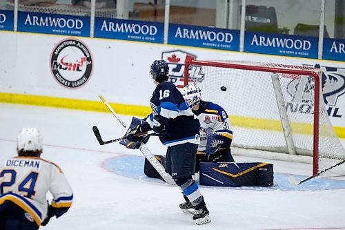 BROOK JONES / WINNIPEG FREE PRESS
The Steinbach Pistons face the Collingwood Blues in Centennial Cup action at Stride Place in Portage la Prairie, Man., Thursday, May 11, 2023.. The 51st edition of Canada's National Junior A Championship runs May 11 to 21. Pictured: Pistons forward Neo Kiemeney screens Blues goalie Noah Pak as the shot by Pistons forward Ian Amsbaugh gets by the goalie to score Steinbach's first goal of the game and to tie the score at 1-1 during second period action. 