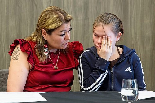 Mike Deal / Winnipeg Free Press
Elle Harris (right), daughter of Morgan Harris, wipes away tears, while sitting with Melissa Normand (left), a cousin of Morgan Harris, during a discussion about the feasibility study regarding Prairie Green and the next steps in the search for her mother&#x2019;s body.
The Assembly of Manitoba Chiefs hold a press conference &quot;in partnership&quot; with Long Plain First Nation and the families of Rebecca Contois, Morgan Harris and Marcedes Myran to announce the completion of the landfill search feasibility study regarding Prairie Green and discuss the next steps at the Wyndham Garden Hotel, Long Plain First Nation, 460 Madison Street, Friday afternoon.
230512 - Friday, May 12, 2023.