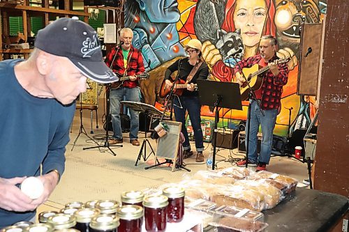 Members of the Wheat City Jug Band perform at the Building Re-Fit Store Saturday morning for the Community Health and Housing Association’s first Global Market of the season. (Kyle Darbyson/The Brandon Sun)