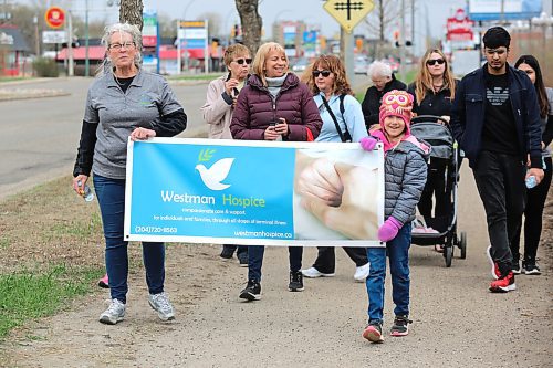 Members of the Westman Hospice Association take part in a walk on Saturday morning in Brandon to raise awareness for their organization and to cap off National Hospice Palliative Care Week. Westman Hospice is still working towards establishing its own stand-alone hospice house in or around Brandon. For more information on the services Westman Hospice currently provides visit westmanhospice.ca. (Kyle Darbyson/The Brandon Sun)
