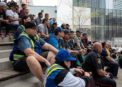 JESSICA LEE / WINNIPEG FREE PRESS

Community patrol groups are photographed May 13, 2023 at True North Square. The groups of about a hundred patrolled around the downtown core afterwards, handing out water and snacks.

Reporter: Gabby Piche