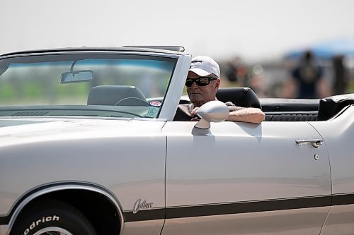 BROOK JONES / WINNIPEG FREE PRESS
The Manitoba Classic and Antique Auto Club hosts the 25th annual Red River Valley Swap meet at Red River Exhibition Park in Winnipeg, Man., Sunday, May 14, 2023. Pictured: Winnipegger Jack Kuhl drives his 1970 Oldsmobile Cutlass Surpeme during the swap event. Kuhl is the fourth owner of his classic car, which features the original engine. The classic car enthusiast placed first in the clasic restored (25 years and older) category at the 2022 Rodarama Car Show. 