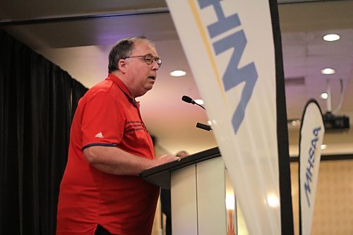 Daryl Ford, who won four provincial A volleyball championships as coach of the the Glenboro Panthers, speaks during his MHSAA Hall of Fame induction. (Thomas Friesen/The Brandon Sun)