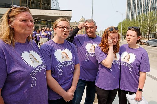 Mike Deal / Winnipeg Free Press
Family members of Jordan Reimer who was killed by a drunk driver, who pleaded guilty Monday morning, outside the Law Courts building at York Avenue and Kennedy Street along with supporters, all wearing purple t-shirts.
(From left) Karen, Alex, Doug, Andi and Nikki Reimer.
230515 - Monday, May 15, 2023.