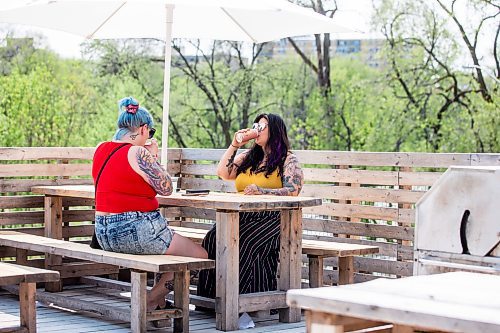 MIKAELA MACKENZIE / WINNIPEG FREE PRESS
 
Breeann Kysuk (left) and Kelly Sangalang enjoy drinks at The Beer Can on Monday, May 15, 2023. For patio Wasney story.

Winnipeg Free Press 2023.