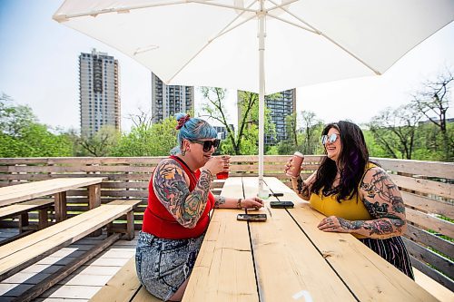 MIKAELA MACKENZIE / WINNIPEG FREE PRESS
 
Breeann Kysuk (left) and Kelly Sangalang enjoy drinks at The Beer Can on Monday, May 15, 2023. For patio Wasney story.

Winnipeg Free Press 2023.