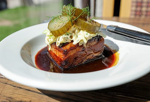 RUTH BONNEVILLE / WINNIPEG FREE PRESS 

ENT - Promenade Brasserie
At 130 Provencher Blvd

Apple Braised Pork Belly

Owner, Jay Lekopoy&#x573; French-Metis heritage and sustainably sourced local ingredients.

Subject: For an upcoming Tasting Notes feature. Promenade Brasserie opened last month in the home of the former Promenade Caf. The new restaurant boasts flavours inspired by owner Jay Lekopoy&#x573; French-Metis heritage and sustainably sourced local ingredients.


Eva Wasney

May 12th,, 2023