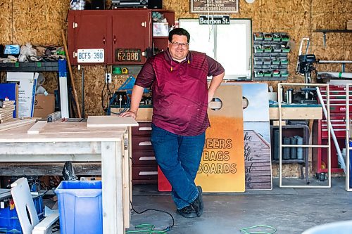 MIKAELA MACKENZIE / WINNIPEG FREE PRESS
 
Steve Olson, owner of the Royal Canadian Cornhole Company, poses for a photo in his shop (where he makes high-quality cornhole games) in Ste. Anne on Tuesday, May 16, 2023. For Dave Sanderson story.

Winnipeg Free Press 2023.