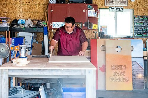 MIKAELA MACKENZIE / WINNIPEG FREE PRESS
 
Steve Olson, owner of the Royal Canadian Cornhole Company, works in his shop (where he makes high-quality cornhole games) in Ste. Anne on Tuesday, May 16, 2023. For Dave Sanderson story.

Winnipeg Free Press 2023.