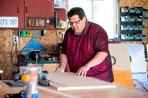 MIKAELA MACKENZIE / WINNIPEG FREE PRESS
Steve Olson, owner of the Royal Canadian Cornhole Company, works in his shop (where he makes high-quality cornhole games) in Ste. Anne on Tuesday, May 16, 2023. For Dave Sanderson story.
Winnipeg Free Press 2023.