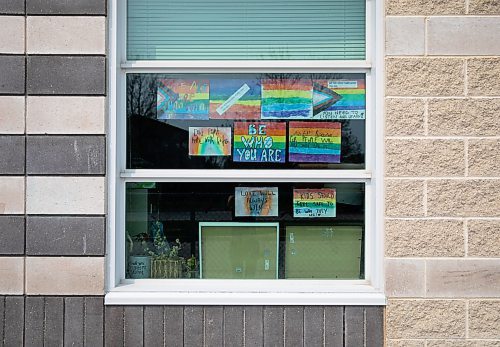 JESSICA LEE / WINNIPEG FREE PRESS

The exterior of Riverbend Community School is photographed May 16, 2023. Over the weekend, a Pride flag was torn down. School administration put up a new pride flag on the inside of the school, as close as they could to the torn down flag. Students also put up their drawings of flags on Monday as a response.

Reporter: Carol Sanders