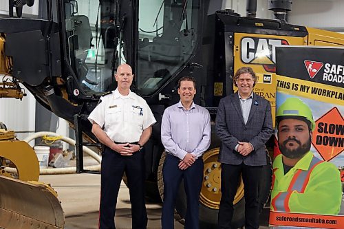 Randy Lewis, Deputy Chief, Brandon Police Service, Jeff Shaw, Safe Work Manitoba and Jeff Fawcett, Mayor of the city of Brandon united for the annual SAFE Roads campaign to spread awareness about worker and driver safety in Brandon on Thursday. (Michele McDougall/The Brandon Sun)