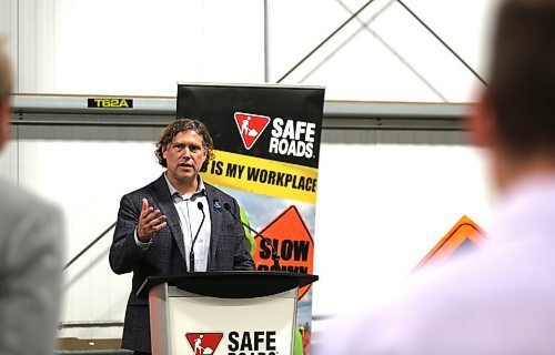 Jeff Fawcett, Mayor of the city of Brandon at the podium for the annual SAFE Roads campaign to spread awareness about worker and driver safety in Brandon on Thursday. (Michele McDougall/The Brandon Sun)