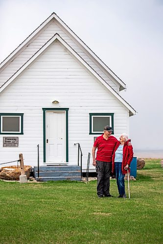 MIKAELA MACKENZIE / WINNIPEG FREE PRESS
 
Glen (left) and Joan Wheeler pose for a photo in front of Star Mound School near Snowflake, Manitoba on Wednesday, May 17, 2023. For Al Small story.

Winnipeg Free Press 2023.