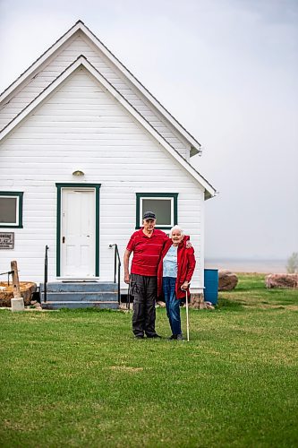 MIKAELA MACKENZIE / WINNIPEG FREE PRESS
 
Glen (left) and Joan Wheeler pose for a photo in front of Star Mound School near Snowflake, Manitoba on Wednesday, May 17, 2023. For Al Small story.

Winnipeg Free Press 2023.