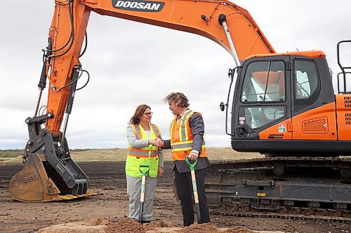 18052023
Manitoba Premier Heather Stefanson and Brandon Mayor Jeff Fawcett shake hands after ceremonially breaking ground on the Outdoor Field Sports Complex on Veterans Way east of First Street North on Thursday. 
(Tim Smith/The Brandon Sun)