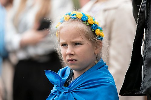 BROOK JONES / WINNIPEG FREE PRESS
Nearly 200 Ukrainians and their supporters gather on the grounds of the Manitoba Legislative Building in Winnipeg, Man., Thursday, May 19, 2023 for Vyshyvanka Day. The annual international holiday is celebrated on the third Thursday of May and is designed to preserve the age-old folk traditions of Ukrainian national clothing, particulary its embroidered clothing. Pictued: Sofia, 6, Svrdan attends the ceremony with her parents. 