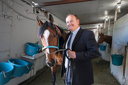 RUTH BONNEVILLE / WINNIPEG FREE PRESS 

SPORTS - Downs

Portrait of  Darren Dunn, Downs CEO, with racing horse named Kickalittlebooty, for story on the opening day at Assiniboia Downs Monday.  


George Williams story. 

May 19th,, 2023