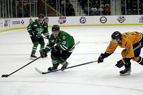 Portage Terriers forward Mike Stubbs works his way by Keefe Marshall of the Yarmouth Mariners during the first period of Friday's Centennial Cup quarterfinal game at Stride Place. (Lucas Punkari/The Brandon Sun)