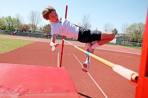 19052023
Charlie Gauthier,  a grade eight student from &#xc9;cole Harrison, leaps over the bar while competing in the high jump event at the school&#x2019;s track and field day at the UCT Stadium on Friday. (Tim Smith/The Brandon Sun)