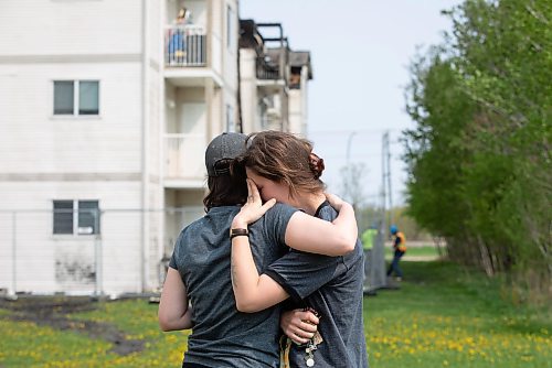 JESSICA LEE / WINNIPEG FREE PRESS

Kay Penner (right) cries into her sister Tallia&#x2019;s shoulder May 20, 2023 at her Sturgeon Heights home at Quail Ridge Apartments. The apartment caught on fire the day before and around 200 residents were displaced.

Reporter: Tyler Searle