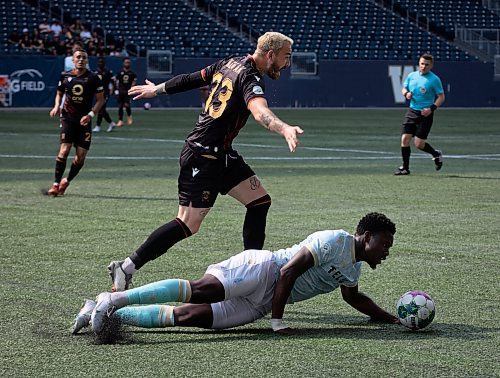 JESSICA LEE / WINNIPEG FREE PRESS

Valour FC player Anthony Novak (23) and Pacific FC player Paul Amedume race for the ball during a game May 20, 2023 at IG Field.

Stand up