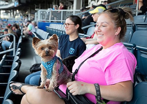 JESSICA LEE / WINNIPEG FREE PRESS

Tiffany Monkman is photographed with her dog Nash May 20, 2023 at IG Field in a Valour FC game against Pacific FC. The team was welcoming dogs to the game.

Stand up