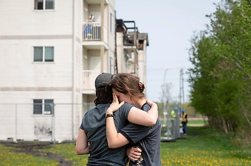 JESSICA LEE / WINNIPEG FREE PRESS

Kay Penner (right) cries into her sister Tallia&#x2019;s shoulder May 20, 2023 at her Sturgeon Heights home at Quail Ridge Apartments. The apartment caught on fire the day before and around 200 residents were displaced.

Reporter: Tyler Searle