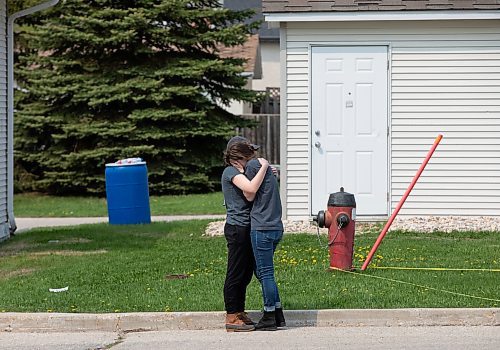 JESSICA LEE / WINNIPEG FREE PRESS

Kay Penner (right) cries into her sister Tallia&#x2019;s shoulder May 20, 2023 at her Sturgeon Heights home at Quail Ridge Apartments. The apartment caught on fire the day before and around 200 residents were displaced.

Reporter: Tyler Searle