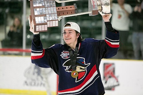 BROOK JONES / WINNIPEG FREE PRESS
The Brooks Bandits (AJHL) defeat the Battlefords North Stars (SJHL) 4-1 to claim the 2023 Centennial Cup at Stride Place in Portage la Prairie, Man., Sunday, May 21, 2023. Pictured: Brooks forward Hunter Wallace, who is from Oak Lake, Man., carries the Centennial Cup as he celebrates the Bandits' third straight championship title. 