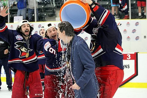 Dominick Campione, left, and Aiden Fink react after Brooks Bandits head coach and general manager Ryan Papaioannou gets a Gatorade bath from Fink and goaltender Ethan Barwick. (Lucas Punkari/The Brandon Sun)