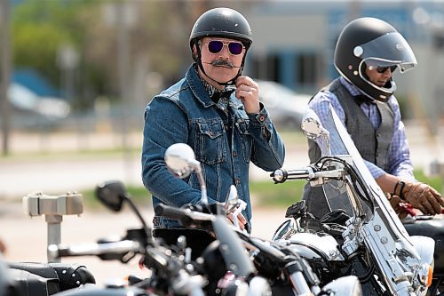 BROOK JONES / WINNIPEG FREE PRESS
Sixty-six riders take part in the 12tn annual Distinguished Genleman's Ride in Winnipeg, Man., Sunday, May 21, 2023. Pictured: Winnipegger Victor Lopes, 45, loosens his helmet strap after completing the local ride on his 2003 Yamaha Road Star. 