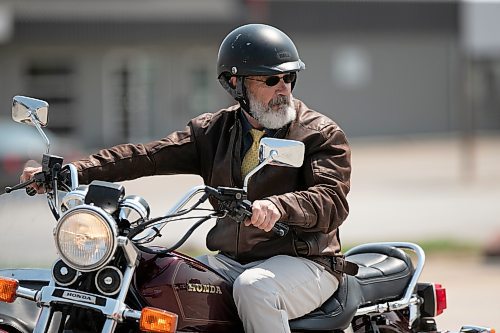 BROOK JONES / WINNIPEG FREE PRESS
Sixty-six riders take part in the 12tn annual Distinguished Genleman's Ride in Winnipeg, Man., Sunday, May 21, 2023. Pictured: Winnipegger Chris Madden, 68, rides his 1984 Honda Gold Wing with a side car during the local ride. 