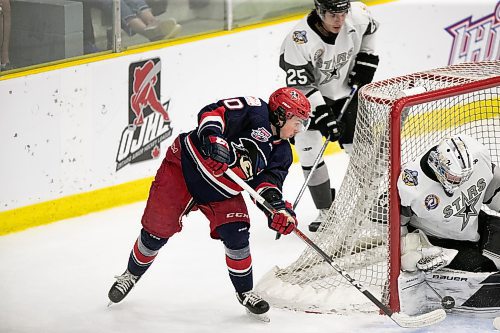 BROOK JONES / WINNIPEG FREE PRESS
The Brooks Bandits (AJHL) defeat the Battlefords North Stars (SJHL) 4-1 to claim the 2023 Centennial Cup at Stride Place in Portage la Prairie, Man., Sunday, May 21, 2023. Pictured: Brooks forward Elliot Dutil tries to get the puck past Battlerfords goalie Josh Kotai during second period action.