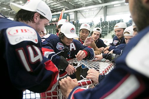 BROOK JONES / WINNIPEG FREE PRESS
The Brooks Bandits (AJHL) defeat the Battlefords North Stars (SJHL) 4-1 to claim the 2023 Centennial Cup at Stride Place in Portage la Prairie, Man., Sunday, May 21, 2023. Pictured: Brooks Bandits forward Brendan Poshak, who is one of the team's assistant captains, cut the mesh from one of the hockey nets during the team's on ice celebration. 