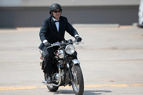 BROOK JONES / WINNIPEG FREE PRESS
Sixty-six riders take part in the 12tn annual Distinguished Genleman's Ride in Winnipeg, Man., Sunday, May 21, 2023. Pictured: Winnipeg resident Tony Lopez, 60, who is riding his 1969 BSA Thunderbolt, is the first rider to arrived at the finish area. 