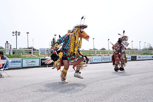 Mike Sudoma/Winnipeg Free Press
Horse dancers entertain the crowd before the first heat at the Indian Horse Relay race held at the Assiniboia Downs Monday afternoon
May 22, 2023