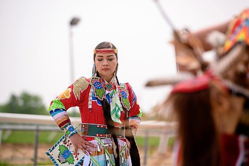 Mike Sudoma/Winnipeg Free Press
A jingle dancer entertains the crowd before the first heat at the Indian Horse Relay race held at the Assiniboia Downs Monday afternoon
May 22, 2023