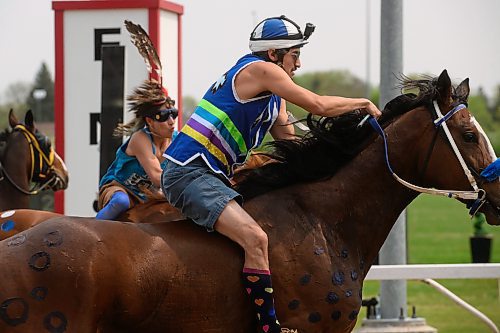 Mike Sudoma/Winnipeg Free Press
Trycen Wuttunee takes off during there start of Heat 2 at the Indian Horse Relay race held at the Assiniboia Downs Monday afternoon
May 22, 2023