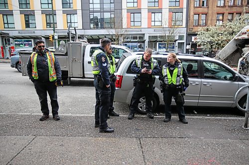 VPD outside Insite a safe injection facility, during de-encampment on East Hastings in Vancouver, Monday, April 17, 2023. (Trevor Hagan / Winnipeg Free Press)