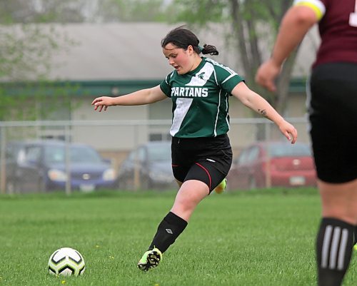 Maci Hlady winds up for a free kick in the Brandon High School Soccer League girls' semifinal at Neelin on Tuesday. (Thomas Friesen/The Brandon Sun)