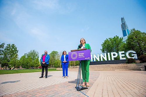 MIKAELA MACKENZIE / WINNIPEG FREE PRESS
 
Families Minister and minister responsible for gender equity Rochelle Squires speaks as president of Pride Winnipeg Barry Karlenzig and premier Heather Stefanson listen at an announcement about Pride funding at The Forks on Tuesday, May 23, 2023. 

Winnipeg Free Press 2023.