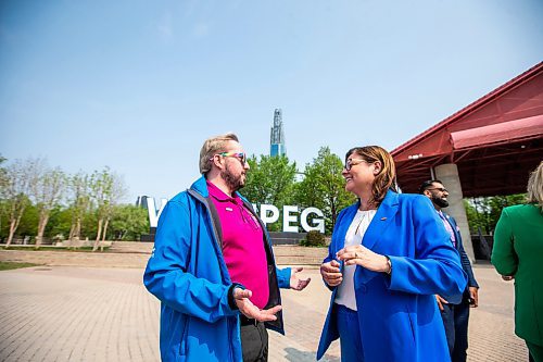 MIKAELA MACKENZIE / WINNIPEG FREE PRESS
 
President of Pride Winnipeg Barry Karlenzig and premier Heather Stefanson chat after making an announcement about Pride funding at The Forks on Tuesday, May 23, 2023. 

Winnipeg Free Press 2023.