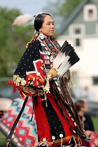 23052023
Katrina Blackwolf performs a women's traditional dance for visitors to the Light Up Your Dance Pow Wow demonstration at Betty Gibson School in Brandon on Tuesday evening.
(Tim Smith/The Brandon Sun)